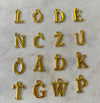 Golden alphabet charm